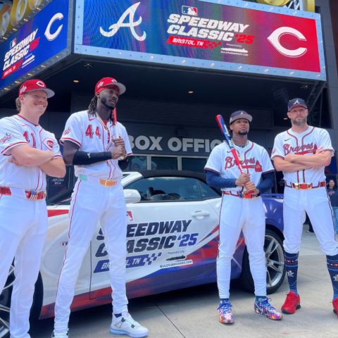MLB All-Star players from the Cincinnati Reds and Atlanta Braves posed for an historic photo beside the MLB Speedway Classic Pace Car Monday prior to Media Day for the MLB All-Star Game in Atlanta. Reds players Andrew Abbott and Elly De La Cruz are on the left and Braves players Ronald Acuna Jr. and Chris Sale are on the right side of the car, which is positioned in front of the Coca-Cola Roxy Theatre in Atlanta.