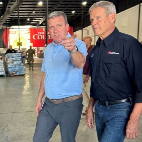 Jerry Caldwell (left) gives Tennessee Governor Bill Lee a tour of the Northeast Tennessee Disaster Relief Center in the Bristol Motor Speedway South Building last fall created to assist those in the region affected by Hurricane Helene's flooding.