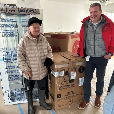 Jerry Caldwell (right) tours a new home being constructed by Appalachia Service Project for a family-in-need near Erwin, Tennessee in the wake of Hurricane Helene's devastation.