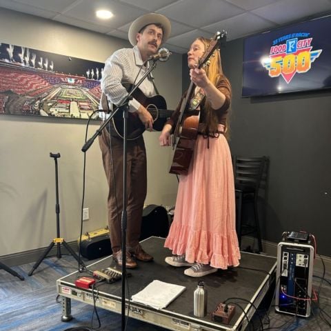The band Virginia West performed today as an example of buskers, during a press conference announcing the partnership between Bristol Motor Speedway and the Birthplace of Country Music. From right to left, Toni Doman and KT Vandyke comprise the band Virginia West.