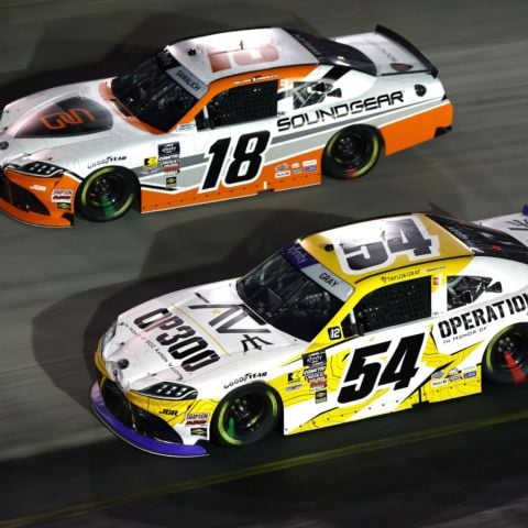Joe Gibbs Racing teammates Taylor Gray (54) and William Sawalich (18) power their Toyotas around The Last Great Colosseum.