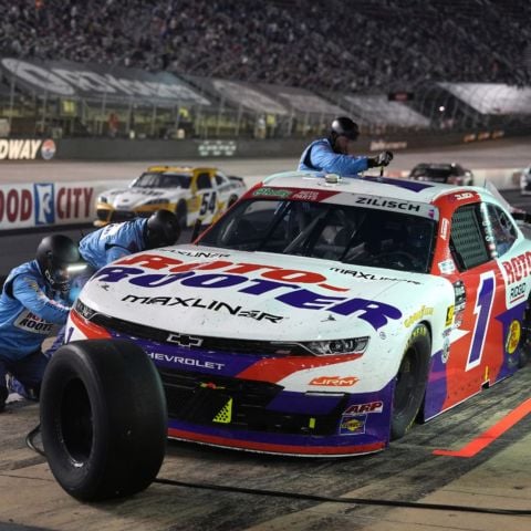 Connor Zilisch gets a quick pit service en route to winning the Suburban Propane 300 Saturday night at Bristol Motor Speedway.