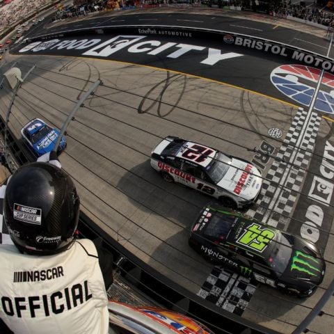 Ty Gibbs (54) crossed the Bristol Motor Speedway finish line just in front of pole-winner Ryan Blaney (12) and defending race winner Kyle Larson (5) Sunday to win the Food City 500, his first career victory in the NASCAR Cup Series.