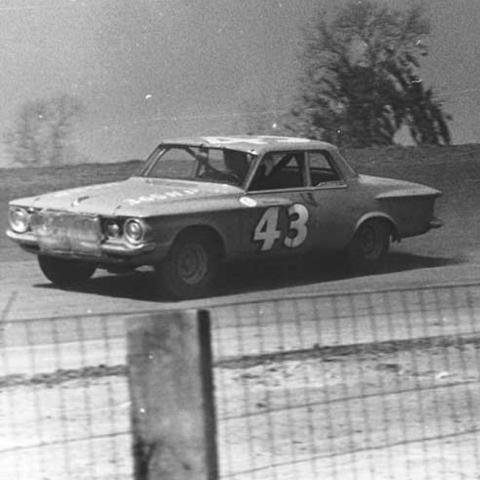 Richard Petty (43) took the checkered flag at NASCAR's last Cup Series race on dirt, held in September 1970 at the North Carolina State Fairgrounds in Raleigh.  Photo from NASCAR archives. 