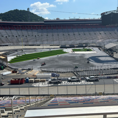 The view from above as the turf installation begins for the MLB Speedway Classic.