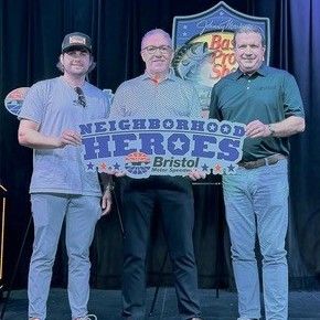 NASCAR Cup Series star Noah Gragson (left) and BMS President Jerry Caldwell (right) congratulated Neighborhood Hero Knoxville honoree Eddie Mannis, founder and president of HonorAir Knoxville Flight during a news luncheon on Monday, Sept. 14.